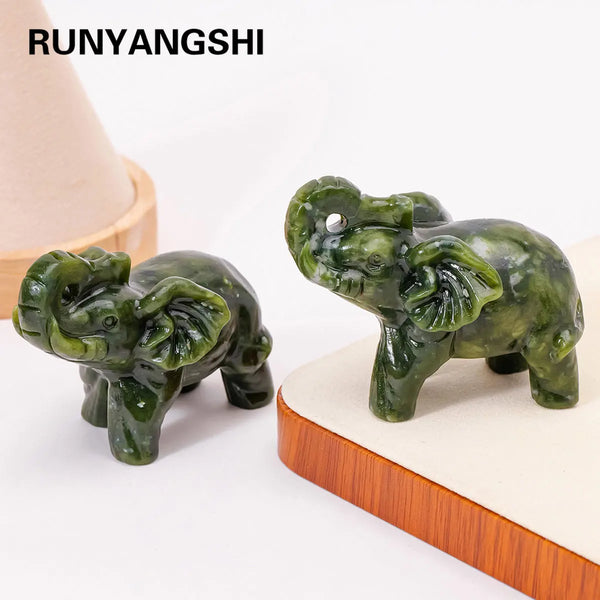 Hand-carved green jade elephant statue used for home decor