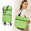 A lime green foldable shopping bag with black straps and wheels is shown next to a woman.