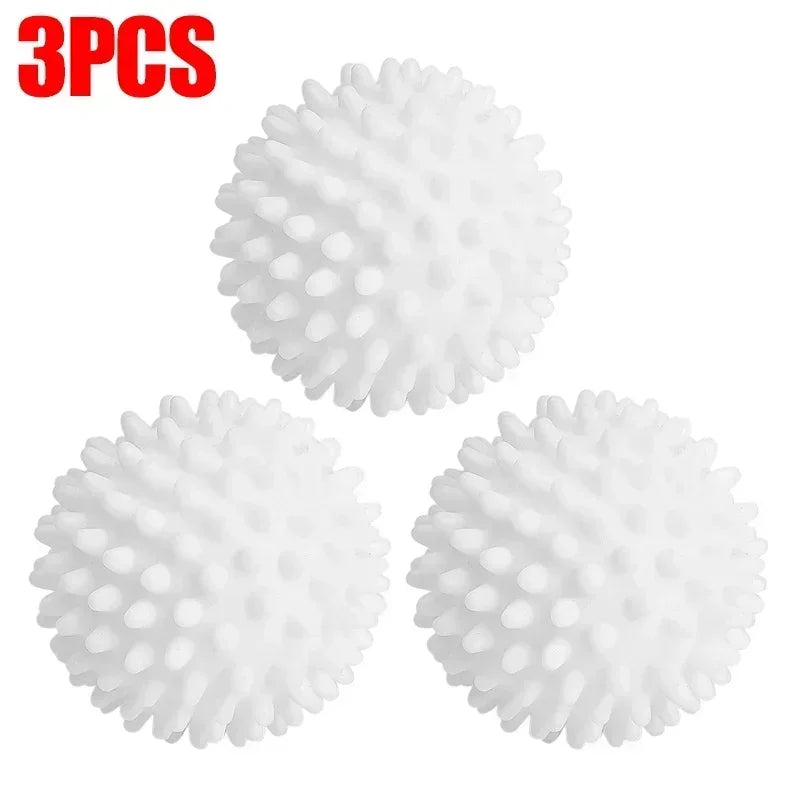 Three white reusable silicone laundry balls shown individually