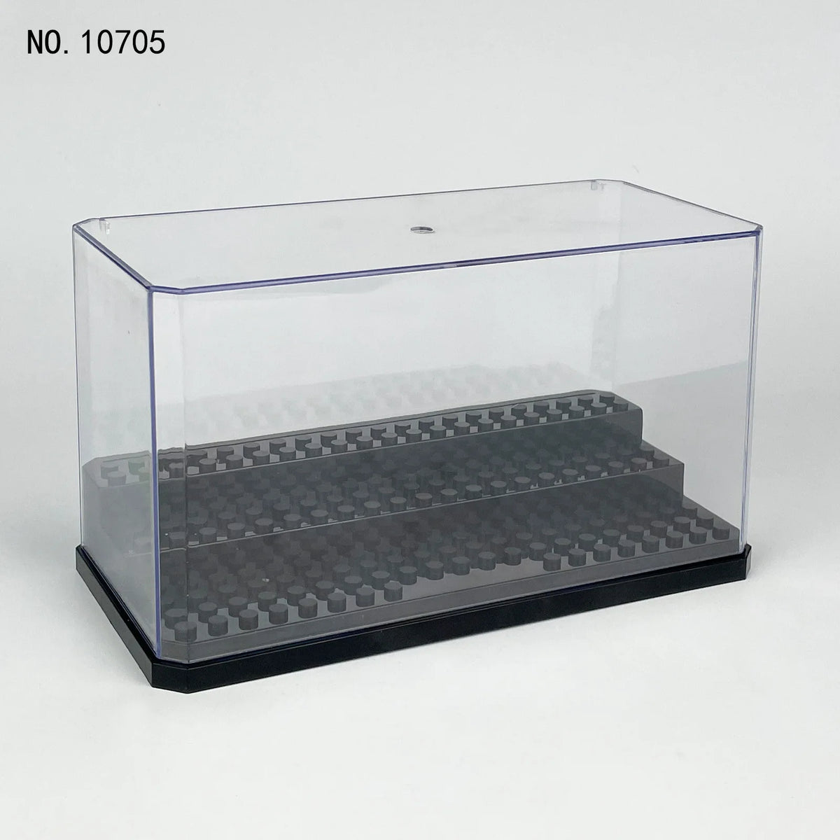A clear dustproof display case with a black base and an internal grid for collectibles.