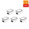 A set of five clear plastic food storage containers with lids, each holding 0.52 liters.