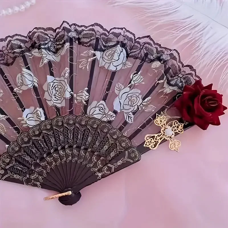 Vintage Spanish flamenco rose lace handheld fan with dark and pink floral patterns