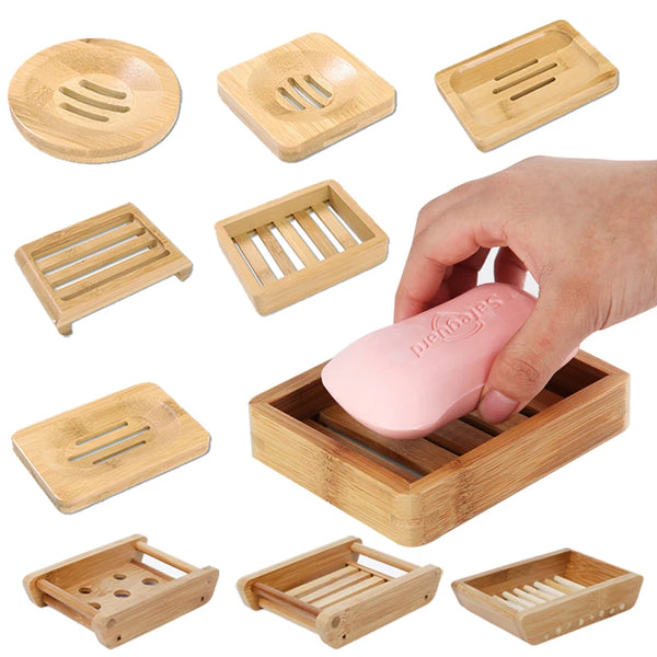 A collection of natural bamboo soap dish holders and a pink soap holder for hand use.