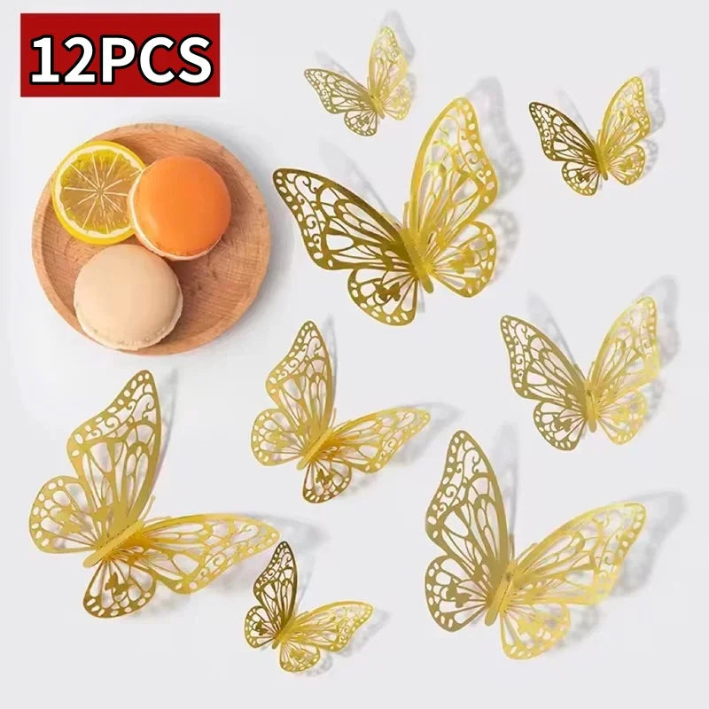 Twelve gold-colored decorative butterfly wall stickers displayed on a white background.