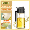 A black plastic dual-purpose oil spray bottle with a narrow spout is shown pouring yellow oil.