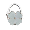 Silver foldable handbag hook with a flower-shaped clasp.