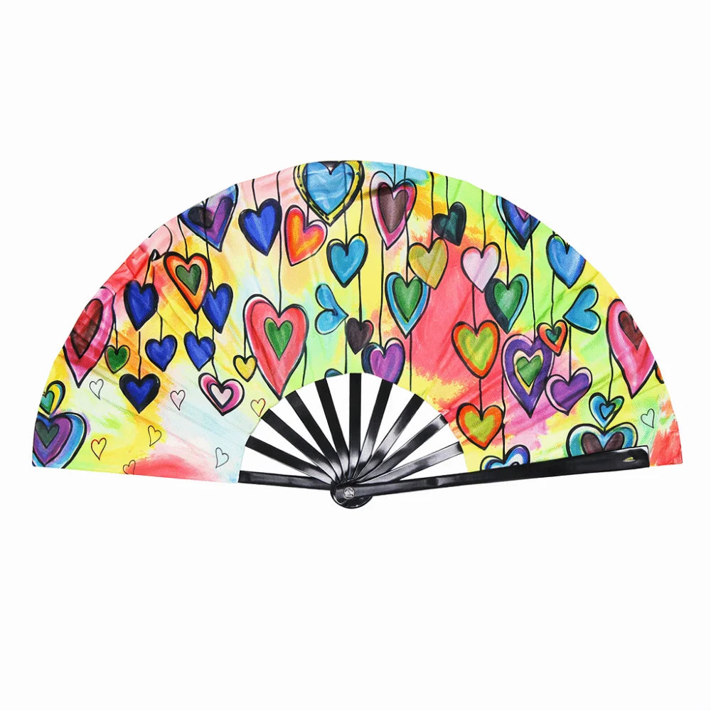 A hand fan with colorful, heart-shaped holographic gradient designs radiating from the center.