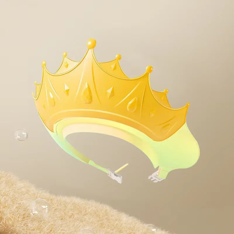 A yellow plastic crown-shaped bath shield cap is shown against a light background.