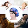 A woman wearing a blue floral satin sleep bonnet, shown in various contexts including sleeping and bathing.