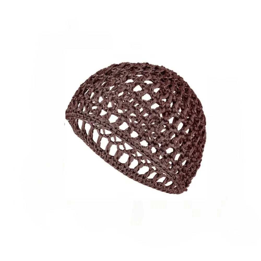 A dark brown, crocheted mesh wig cap for hair and turban wear.