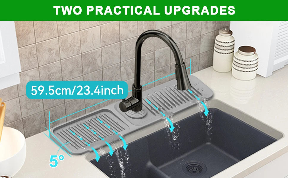 A close-up of a kitchen sink with a silicone splash guard mat being used to direct water flow.