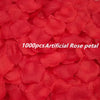 A close-up of 1000 pieces of artificial red rose petals.