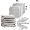 A set of silver microfiber cleaning pads and dishcloths stacked in various sizes.