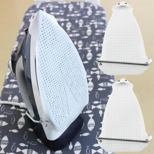 A white universal iron protective cover shield is shown resting on a patterned cloth.