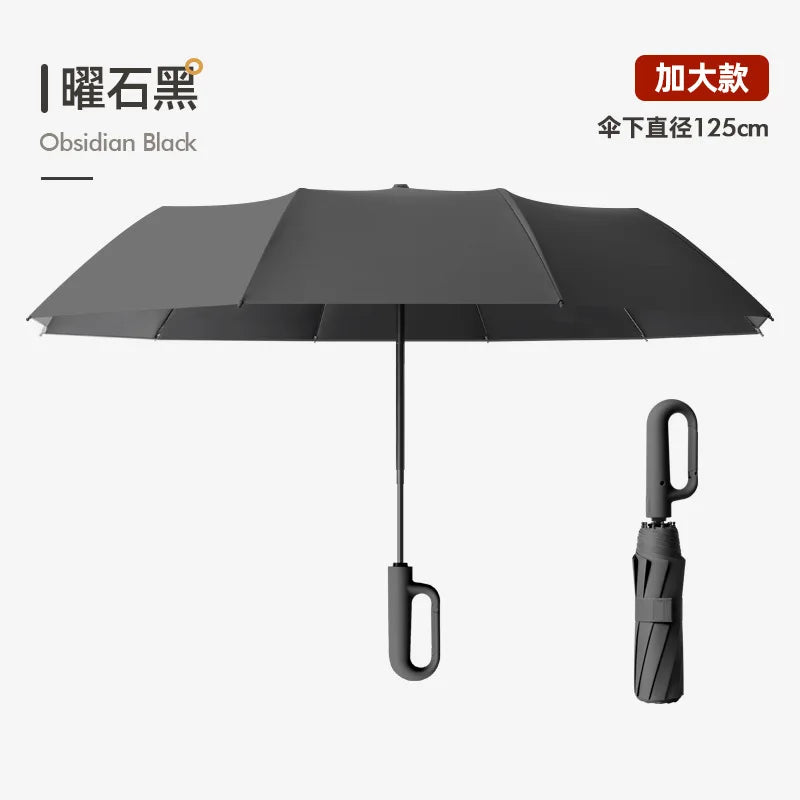 Black obsidian umbrella with a reinforced shaft and folding mechanism