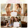 Two young women smiling while holding a white floral quilted Bible cover bag.
