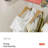 Stainless steel drying rope with 20cm spacing hanging white clothing on a wooden hanger