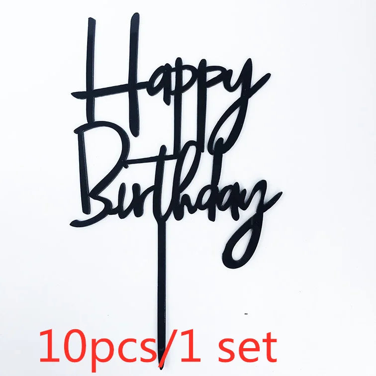 Black acrylic birthday cake toppers spelling out Happy Birthday