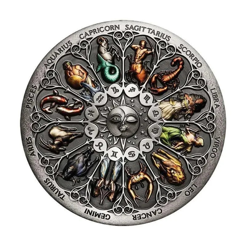 A silver commemorative coin featuring twelve zodiac constellations arranged in a circular design.