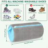 A gray reusable shoe washing bag with a blue zipper, shown next to various types of shoes.