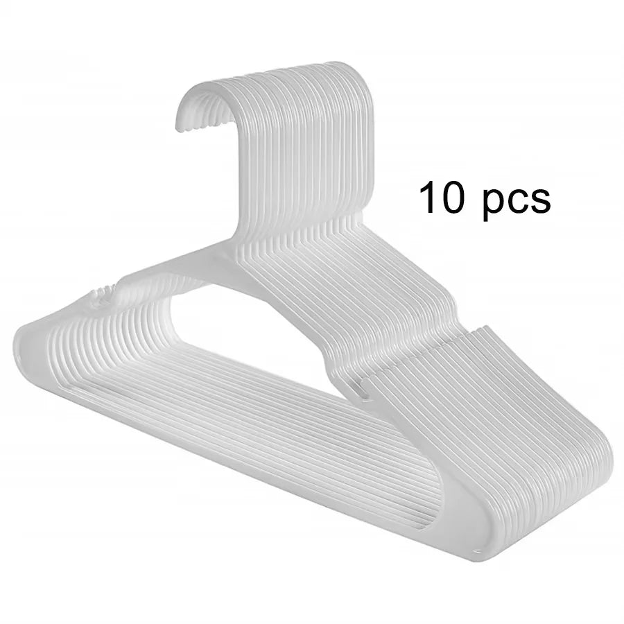 A set of ten white plastic clothes hangers with ribbed design.