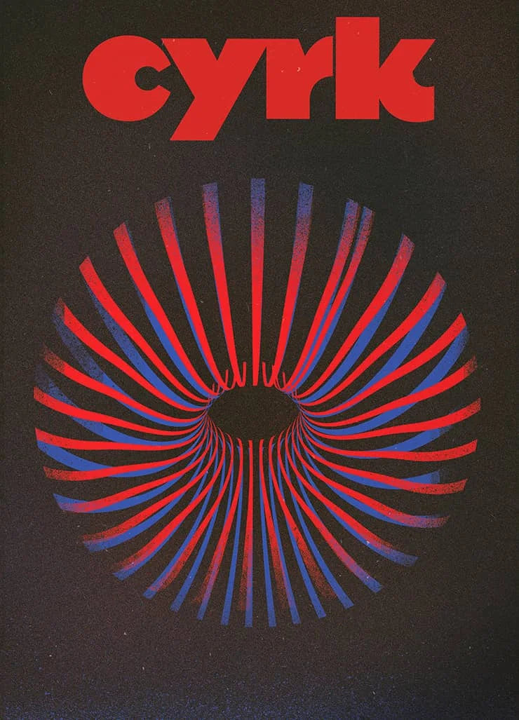 A graphic design featuring the word CYRK in red text above a radial pattern of red and blue lines on a dark background.