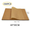 A roll of tan non-stick baking parchment paper, measuring 16 inches by 30 cm.