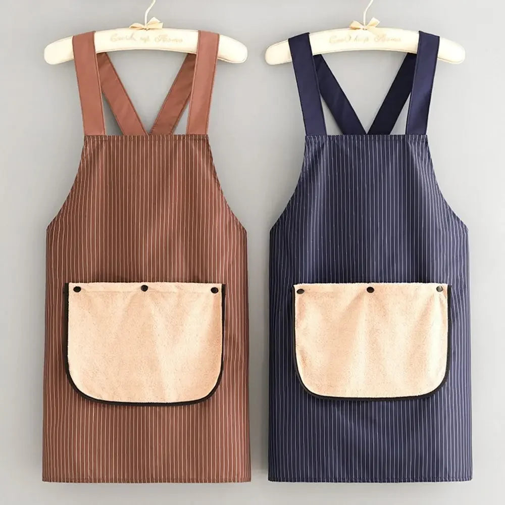 A brown striped waterproof sleeveless kitchen apron with a removable hand towel hanging on a wooden hanger.