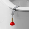 A silver and wood portable toilet lid lifter attached to a white ceramic toilet rim.