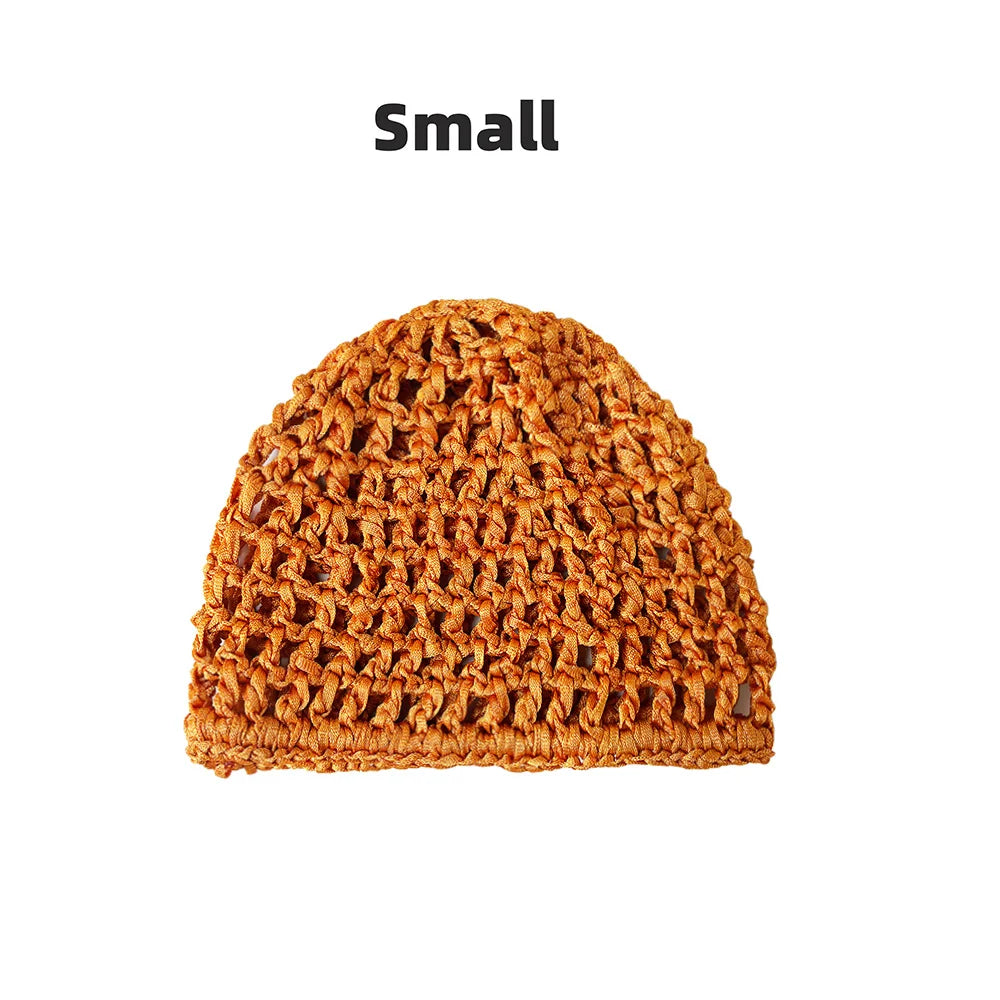 A small, hand-crocheted mesh hair net cap in a warm brown color.