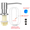 Under-sink kitchen soap dispenser featuring a metal pump, silicone extension tube, and gravity balls.