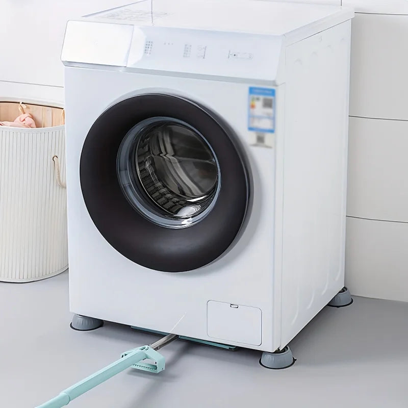 White washing machine with anti-vibration feet installed on the floor.