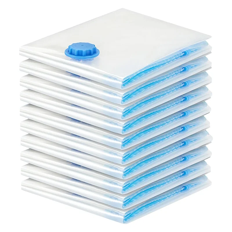 A stack of clear reusable vacuum storage bags for clothing with a blue sealing disc.
