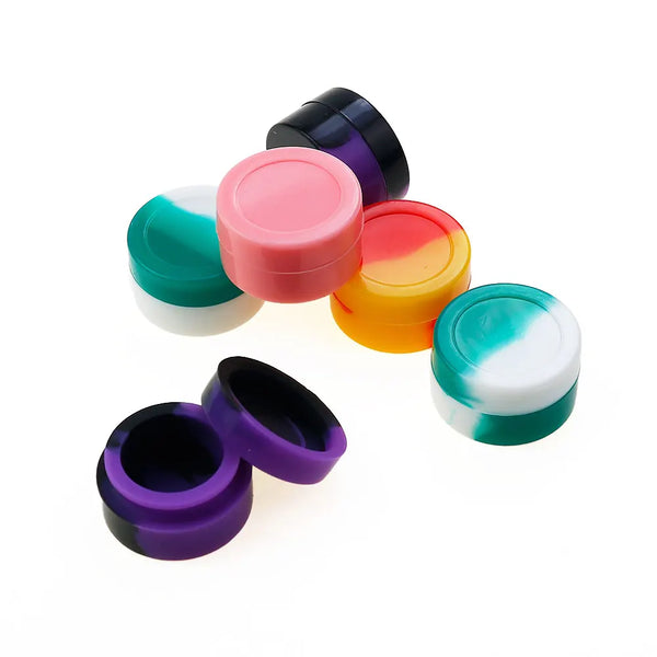 A collection of colorful, round silicone storage jars in pink, orange, purple, and teal.