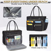 Black quilted tote bag with multiple pockets and elastic loops for pens