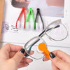 A hand holds a pair of eyeglasses next to various colored cleaning tools including silicone tips and a brush.