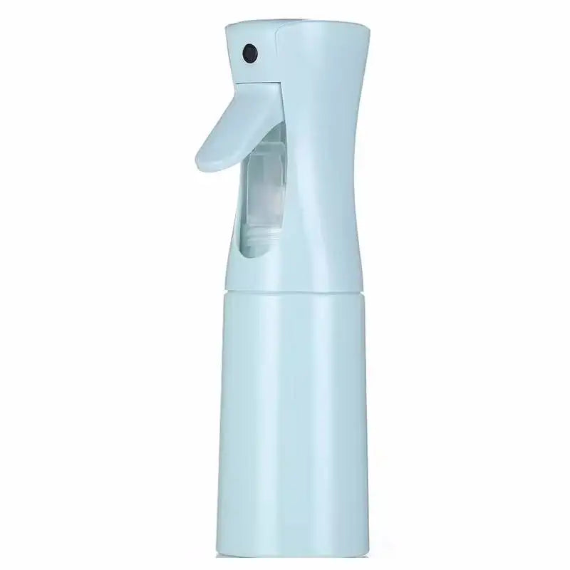 A light blue refillable continuous mist spray bottle with a hinged nozzle.