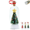 A clear glass bottle filled with sparkling white material and decorated with a gold star and a green Christmas tree.