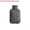 A gray knitted cover for a hot water bottle, featuring a ribbed texture.