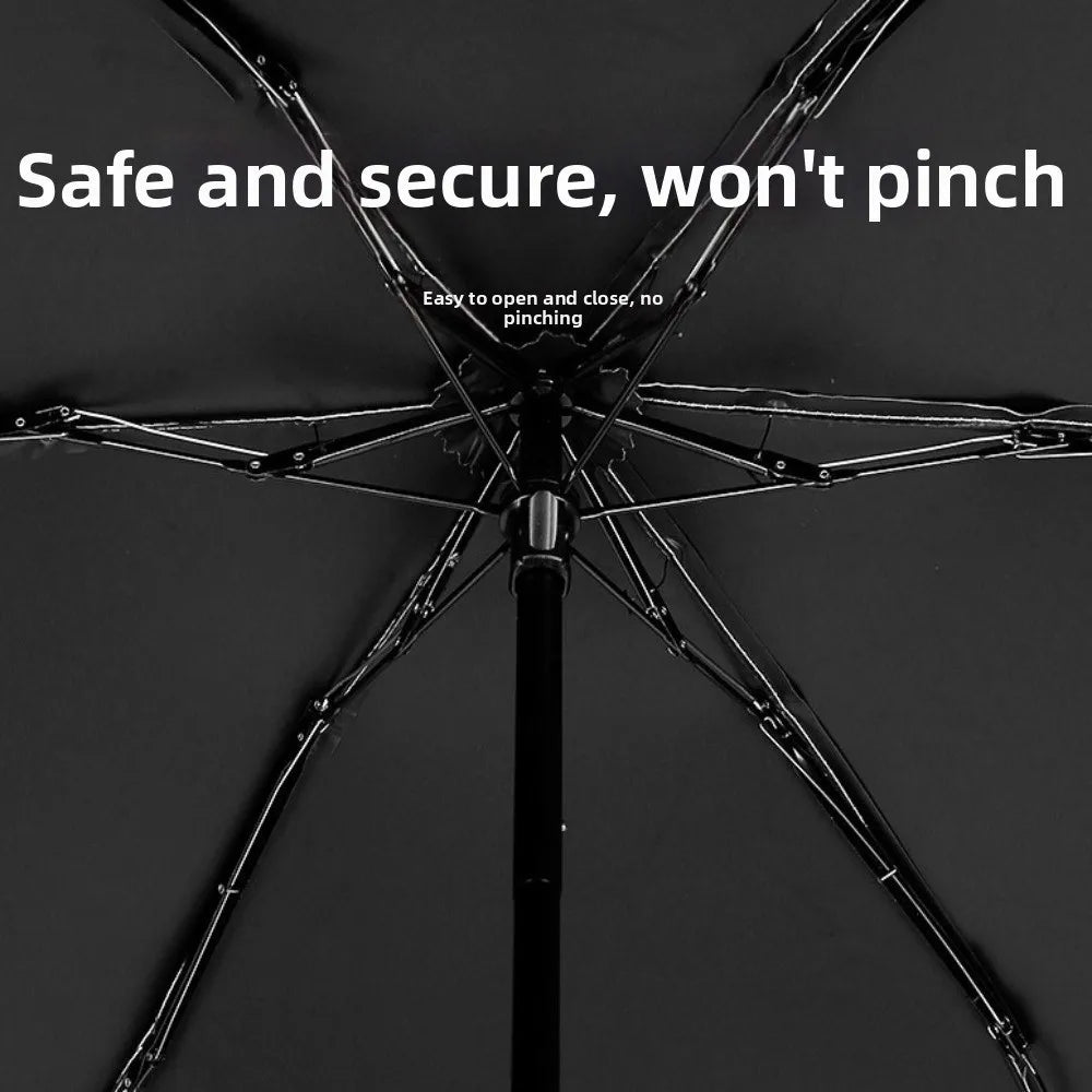 A black compact 5-fold lace umbrella with a golden curved handle shown against a dark background.