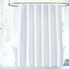 White waffle style heavy-duty shower curtain hanging from a metal rod in a bathroom setting.