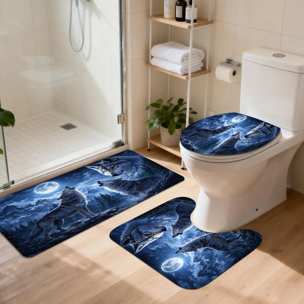 Set of three blue and white nature-themed non-slip bathroom mats placed on a wooden floor.