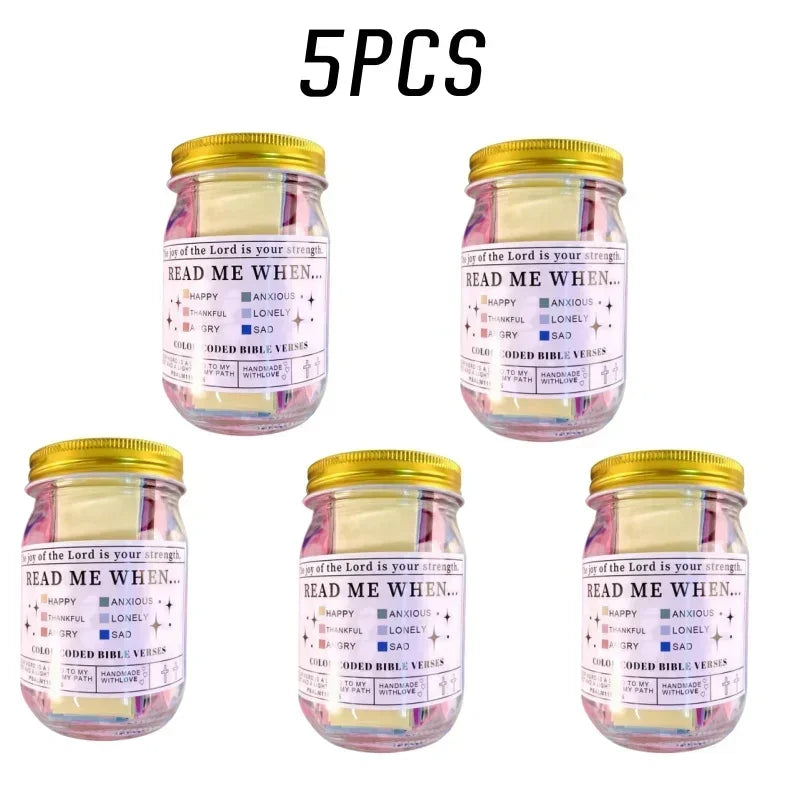 Five glass jars filled with colorful scripture verses for religious or inspirational use