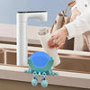 A white kitchen faucet is dispensing water into a glass, with a blue sponge holder visible below.