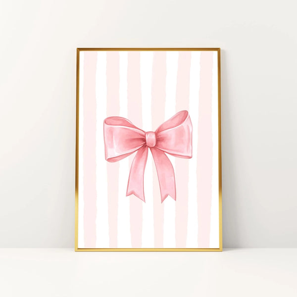 Pink striped canvas wall art featuring a pink bow design in gold frame