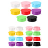 A collection of reusable silicone vial caps in various colors including white, pink, blue, red, purple, and black.