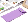 A purple PU leather eyewear case or glasses bag lying next to an open book.