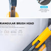 Close-up of a yellow cleaning tool with a triangular brush head used for scraping and brushing stains on a surface.