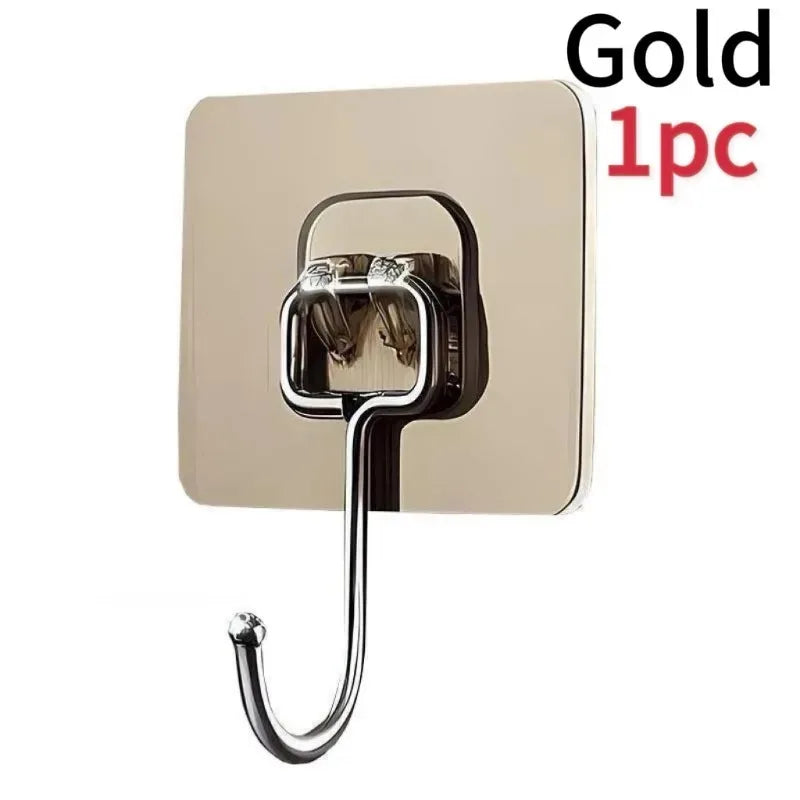 Gold self-adhesive rotating wall hooks for storage, sold as a single piece.