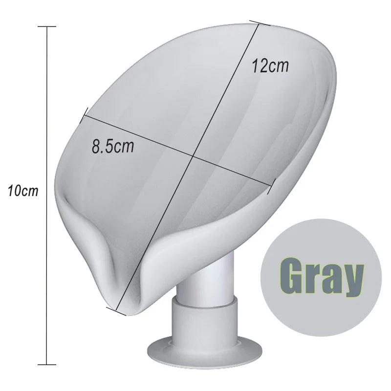 A gray leaf-shaped suction cup soap dish shown from the side with dimensions.